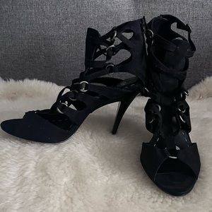 A pair of black suede Abate stiletto